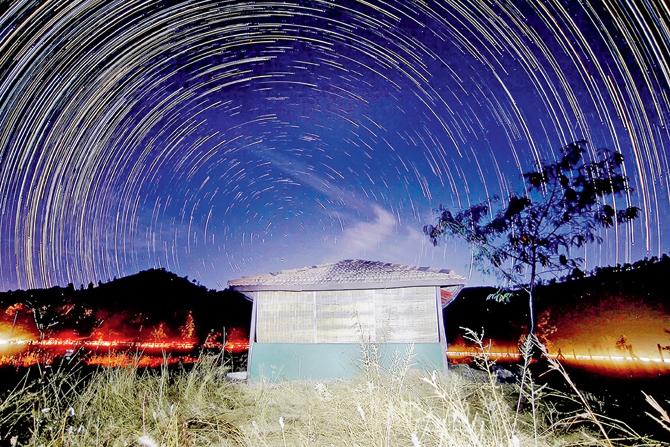 A long exposure photograph of star trails captured at the workshop venue
