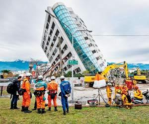 Taiwan rescue workers pull out more bodies
