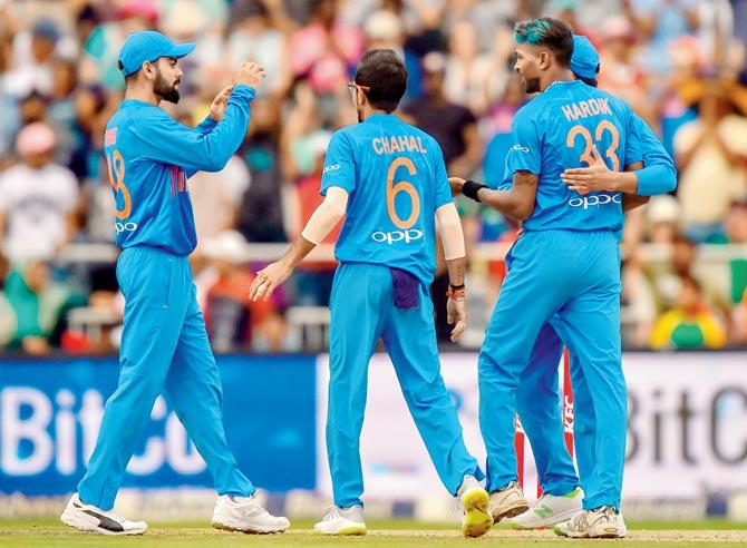 India captain Virat Kohli (left) celebrates the dismissal of South Africa’s David Miller with his teammates during the first T20I at The Wanderers in Johannesburg on Sunday. Pic/AFP