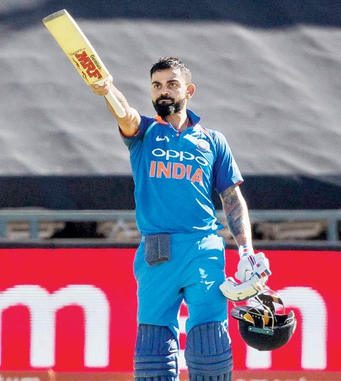 An ecstatic Virat Kohli after scoring his 34th ODI century during the third limited overs game against South Africa yesterday. Pic/PTI