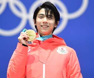 Hanyu breaks 66-year old record to defend men's figure skating title