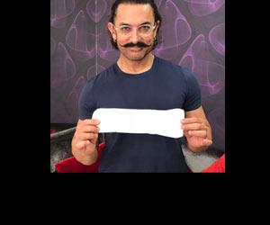 Aamir Khan poses with sanitary pad, challenges Amitabh, SRK, and Salman to do so