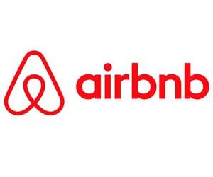 Airbnb woos high-end customers, expands into luxury homes