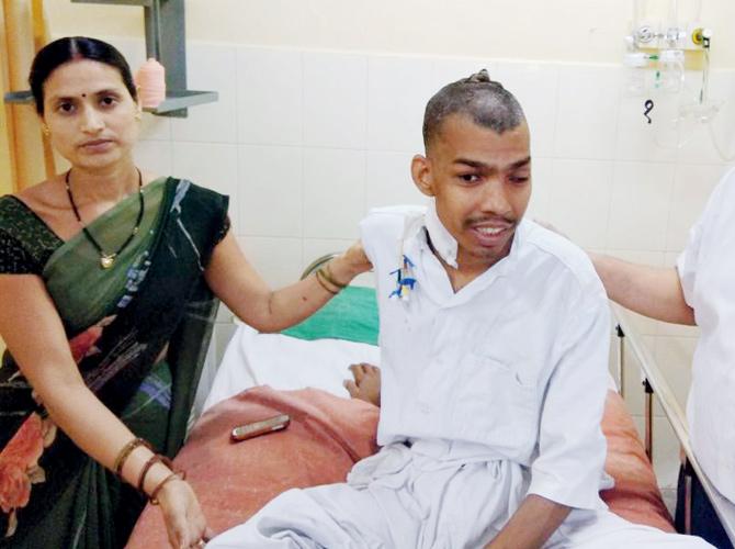 Santlal Pal with his wife at Nair hospital after the removal of the tumour