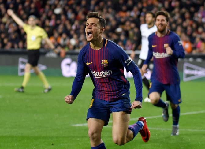 Barcelona midfielder Philippe Coutinho celebrates a goal against Valencia CF during the Spanish 