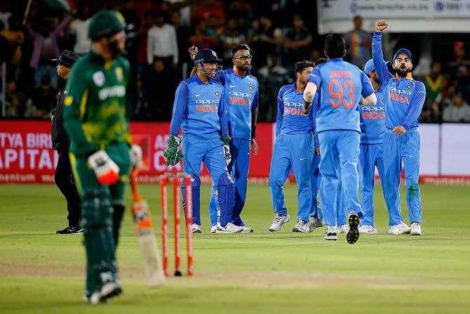 The Indian players celebrate after winning the 1st T20I match in Johannesburg. Pic/ PTI
