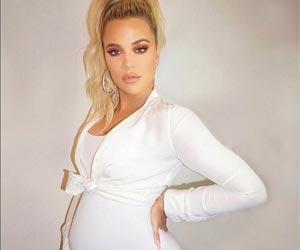 Khloe Kardashian flaunts baby bump