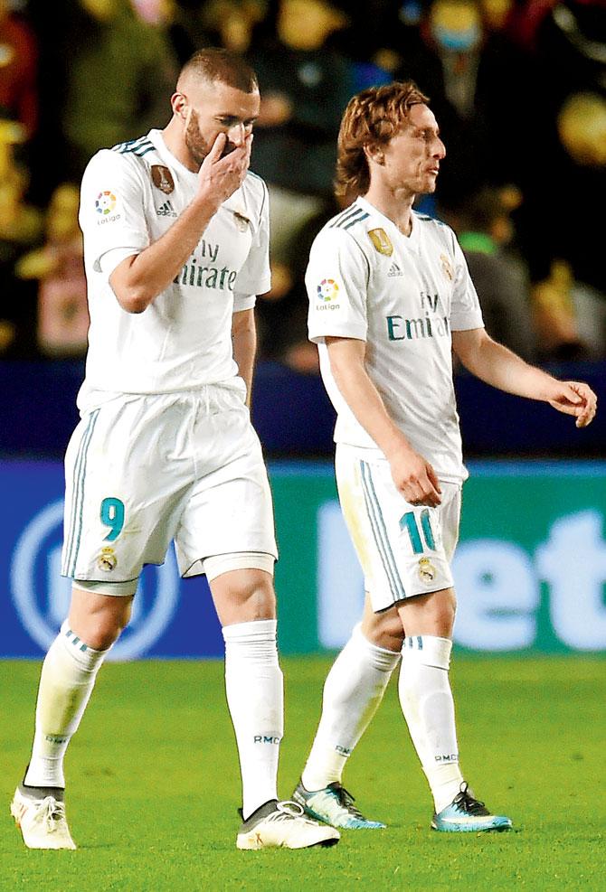 Real Madrids Karim Benzema and Luka Modric (right) are stunned as Levante equalise 
