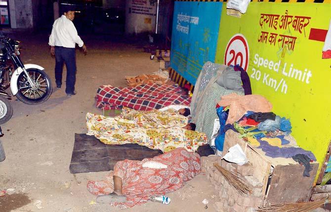 Encroachers have made makeshift beds along the footpath