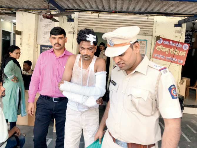 Accused, Pravin Kumar Kushwaha, being thrashed by the mob on Tuesday evening