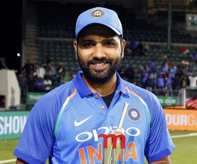 Rohit Sharma holds his trophy after being named Man Of The Match in the fifth ODI against South Africa in Port Elizabeth. Pic/ AP/PTI