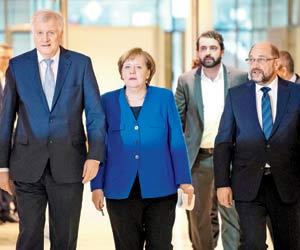 Angela Merkel pledges 'fresh start' for Europe with new government