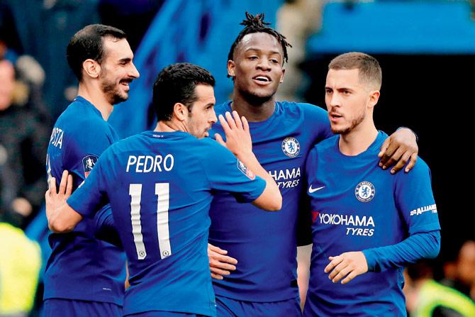 Chelseas Michy Batshuayi (second from right) celebrates his goal with teammates during a FA Cup match against Newcastle United at Stamford Bridge in London yesterday. Chelsea won 3-0. pic/AFP