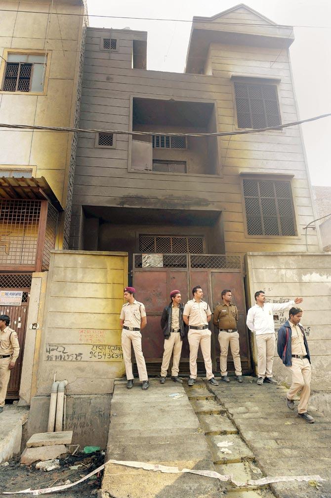 Police outside the firecracker factory. Pic/PTI