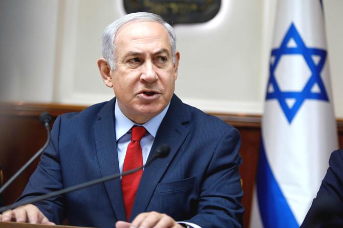Israeli Prime Minister Benjamin Netanyahu opens the weekly cabinet meeting at his Jerusalem office on December 31, 2017. Pic/AFP