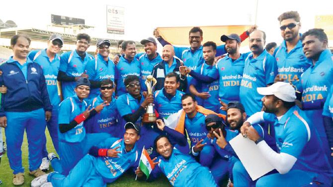 The Indian blind team celebrate their World Cup final win over Pakistan in Sharjah on Saturday