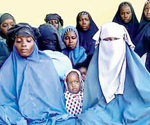 Boko Haram's latest video has Chibok girls saying they will not return