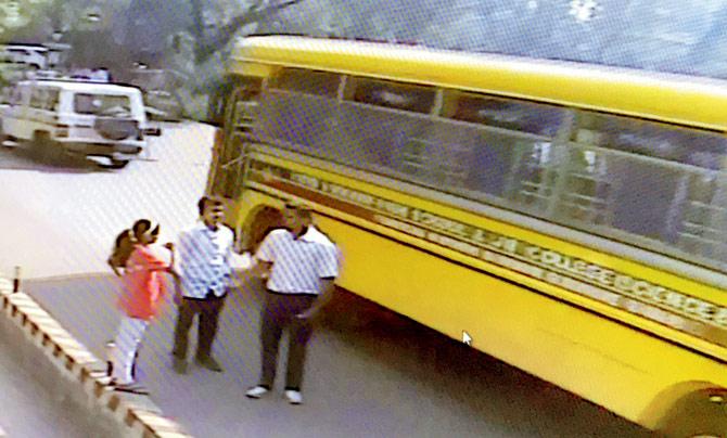 At the main entrance of the school