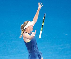 Denmark's Caroline Wozniacki lifts her first Grand Slam title