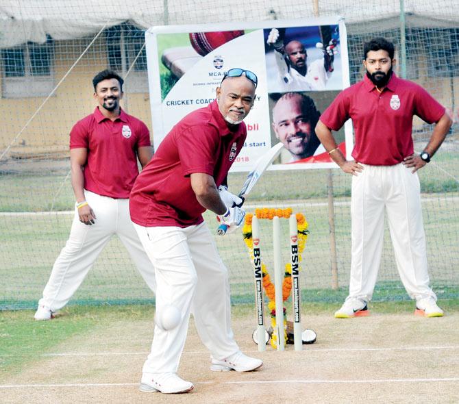 Vinod Kambli (centre) during the launch of his coaching nets at Bandra Kurla Complex yesterday. Pic/Prakash Parsekar