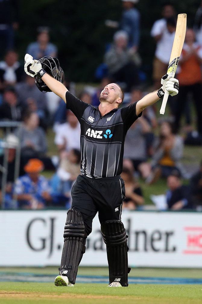 New Zealands Colin Munro celebrates his century during the third Twenty20 international cricket match between New Zealand and the West Indies at Bay Oval in Mount Maunganui on January 3, 2018. Pic/ AFP PHOTO