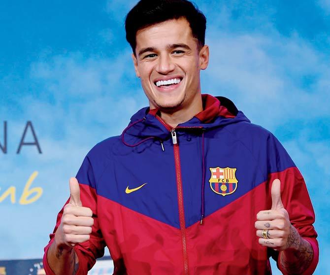 Coutinho poses for a picture in Barcelona last night. Pic/ AFP