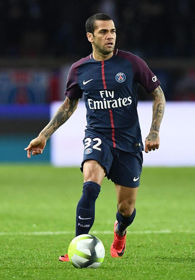 This file photo taken on December 9, 2017 shows Paris Saint-Germains Brazilian defender Dani Alves playing the ball during the French Ligue 1 football match between Paris Saint-Germain and Lille at the Parc des Princes stadium in Paris. Alves has been handed a three-game ban by the French league (LFP) following his sending-off against Lyon on January 21, AFP reports on January 25, 2018. Pic/ AFP PHOTO