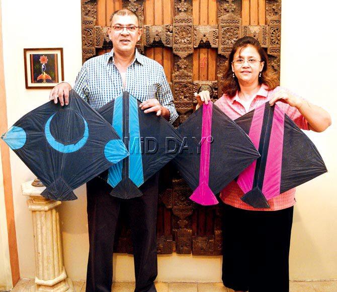 Dev and Neha Ghia in Saraswati Niwas against a 300-year-old carved wood door from her grandfather Chandrakant Shroff