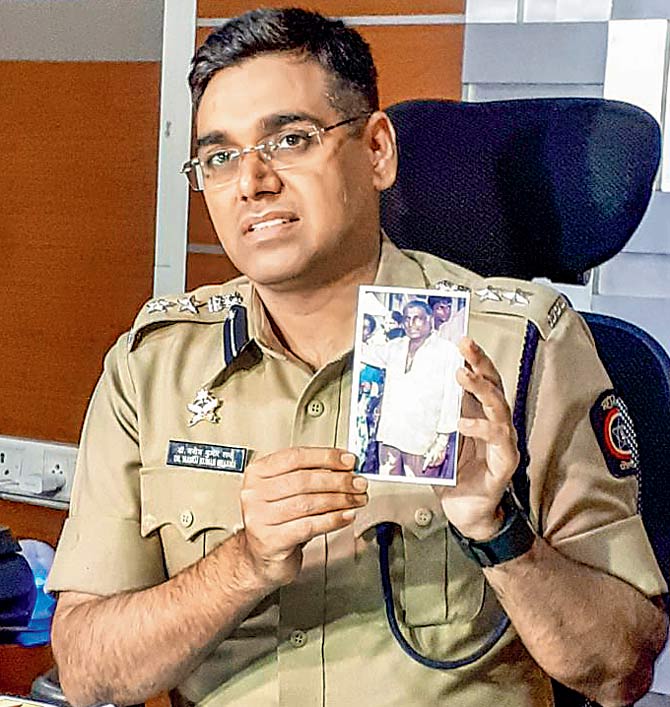 Dr Manojkumar Sharma, DCP (zone I), shows a picture of the victim