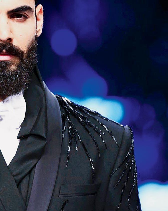 Tuxedo details from his menswear collection
