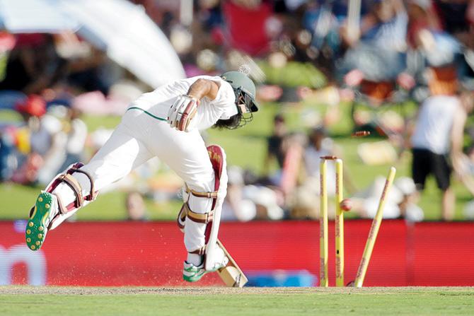 SA batsman Hashim Amla is run out by Hardik Pandya on Saturday. Pic/AFP