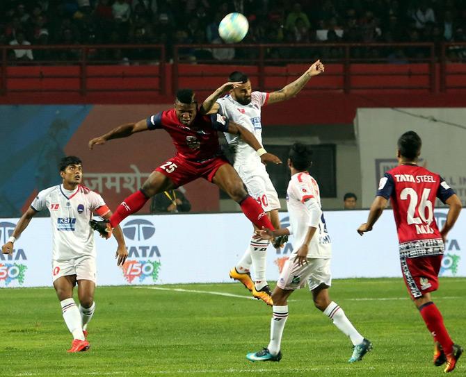 Players in action at Indian Super League (ISL) football match between Jamshedpur FC (JFC) and Delhi Dynamos FC (DDFC) at JRD Tata Sport Complex in Jamshedpur, Jharkhand on Sunday. Pic/PTI