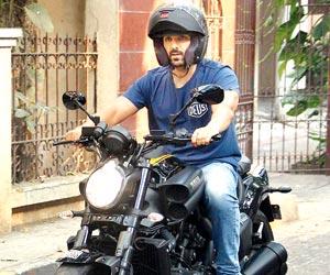 John Abraham takes one of his favourite bikes for a cruise in Bandra