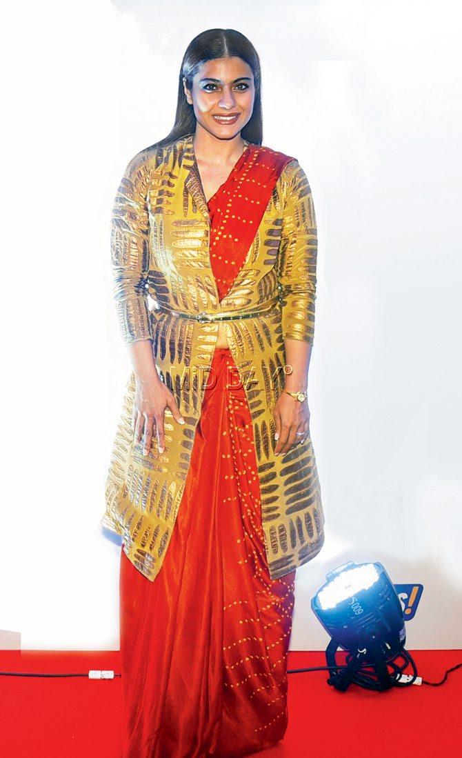 Belt a jacket over your saree and play with its drape like Kajol, for a twist in your desi look. pic/sameer markande