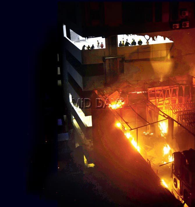 The rooftop of Trade House building in Kamala Mills, Lower Parel, ablaze on December 28. Pic/Sameer Markande