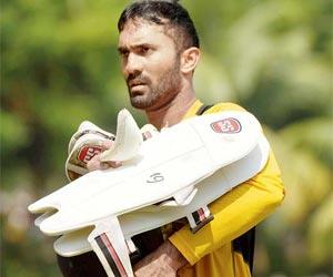 Dinesh Karthik shines as Tamil N beat Andhra by seven wickets