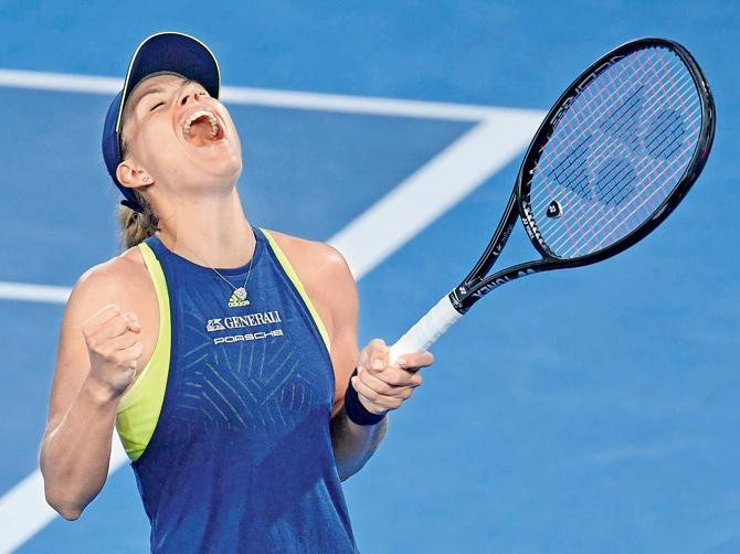 Kerber is ecstatic after beating Sharapova