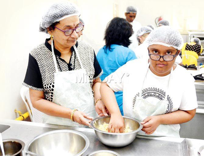 Yojana Wavikar with her daughter Kimaya attends the 6 month diploma course in food and beverage production for children with developmental disablities at St. Andrews college in Bandra,  Pic/ Sneha Kharabe