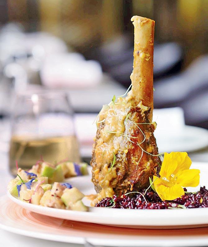 Lamb shank cooked with bottle masala