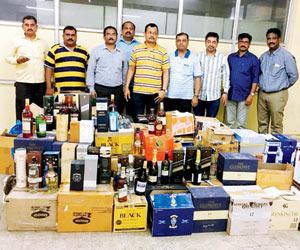 Liquor bottles worth Rs 2 crore seized from Andheri, two nabbed