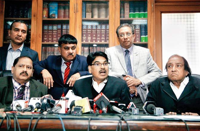 Bar Council of India Chairman Manan Kumar Mishra and other members address a press conference in New Delhi. Pic/PTI