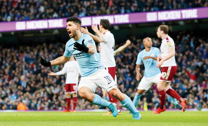 Manchester Citys Sergio Aguero is ecstatic after scoring against Burnley at the Etihad Stadium on Saturday. PIC/GETTY IMAGES