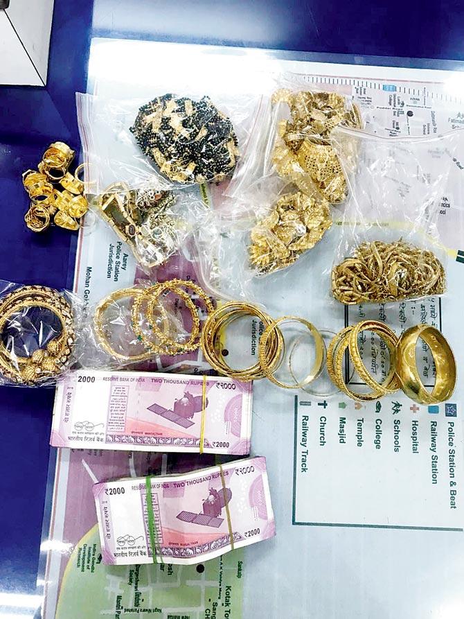 The recovered jewellery and cash from the two teenaged accused