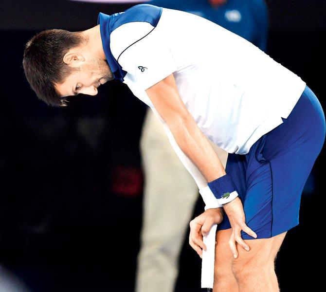 Novak Djokovic reacts during his fourth-round Australian Open clash against Chung Hyeon yesterday. The Serbian lost 6-7 (4/7), 5-7, 6-7 (3/7) in three hours, 21 mins. Pics/AFP