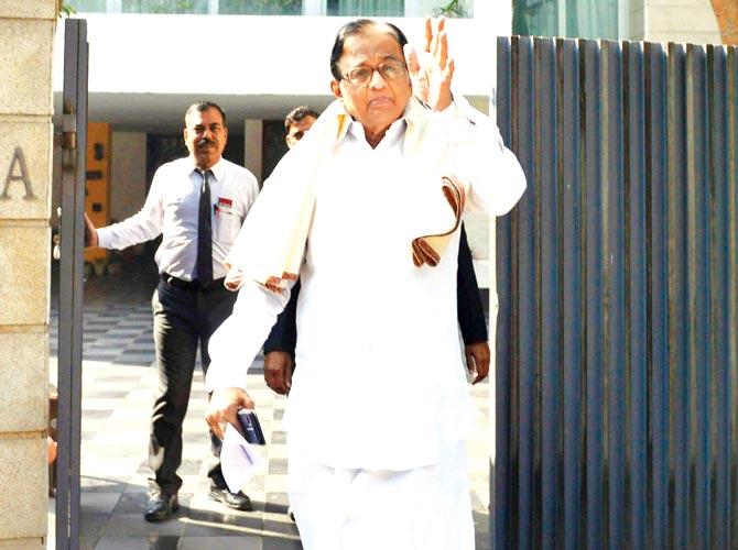 P Chidambaram, outside his Delhi residence following the ED raid, on Saturday. Pics/PTI