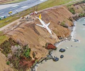 Plane skids off Turkish runway and plunges towards sea