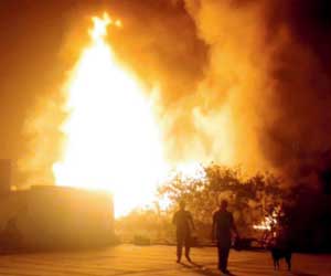 Fire behind showroom opposite Phoenix Mills