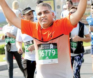 Mumbai resident runs his first marathon on Republic Day in Dubai with tricolour