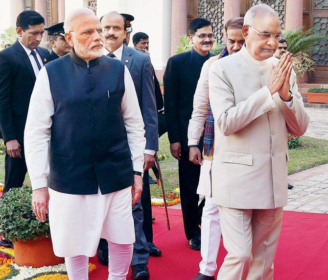 President Ram Nath Kovind (R) and Prime Minister Narendra Modi (L) arrive ahead of the Budget session at Parliament house yesterday. Pic/AFP