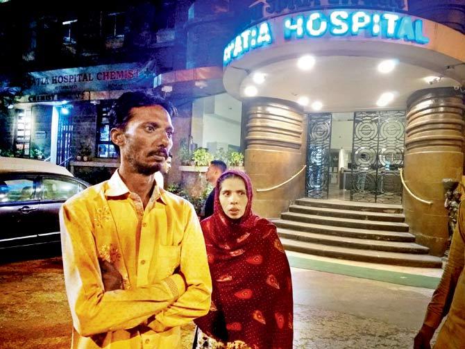 Syed Qureshi, 43, with his wife outside Bhatia hospital